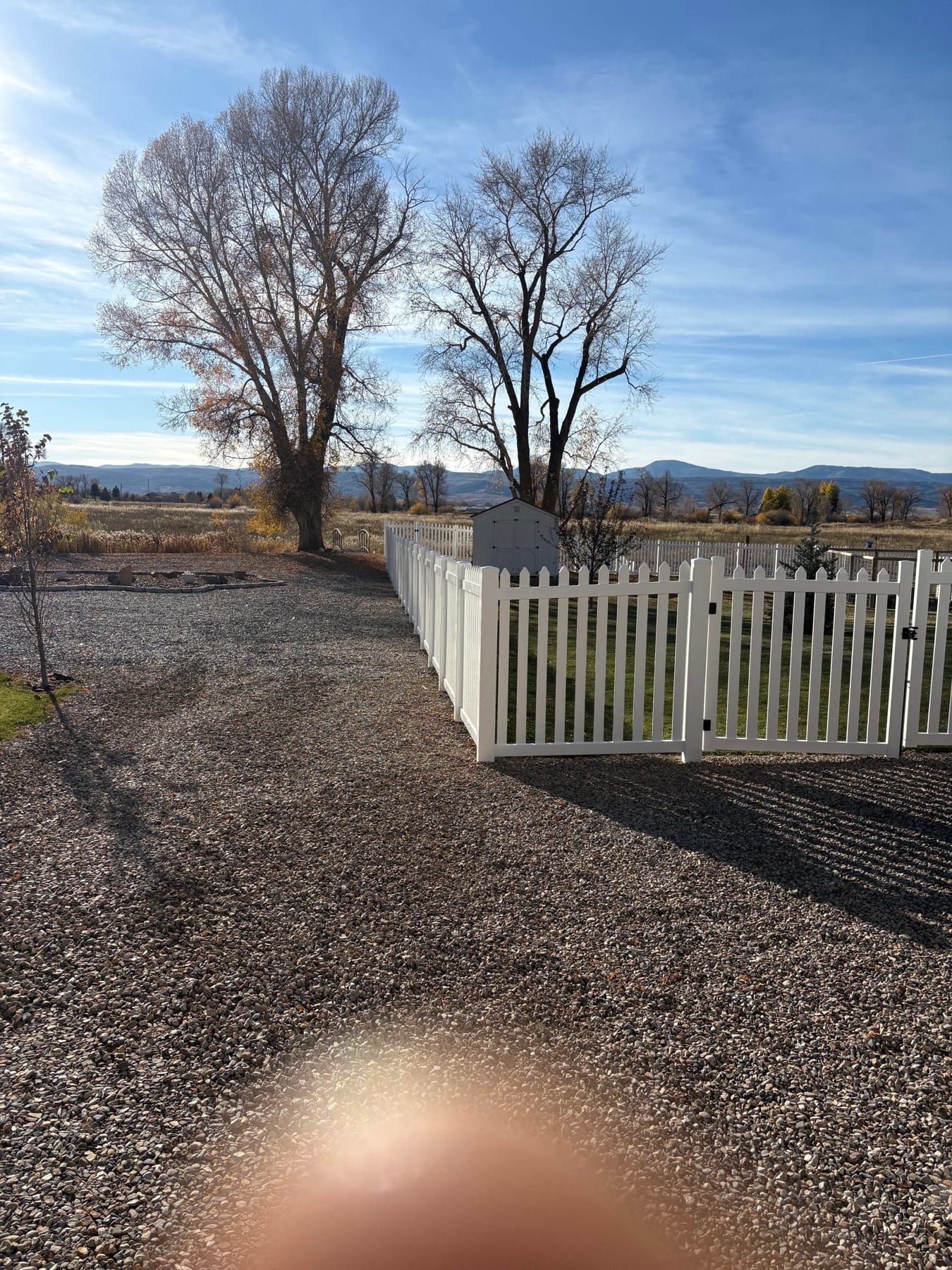 White Picket Fence & Gravel Landscaping - Image 1