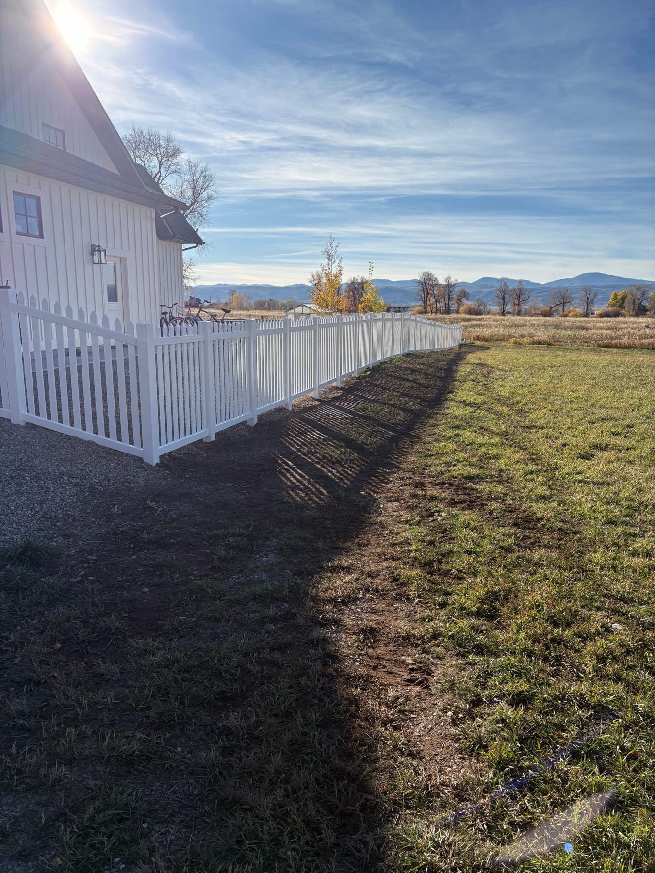 White Picket Fence & Gravel Landscaping - Image 2